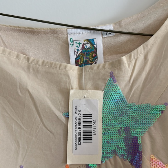 Queen of Sparkles. NWT size XS tan star dress. - Picture 3 of 4